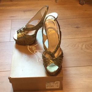 Christian Louboutin Fortuna 140 Lurex gold shoes.